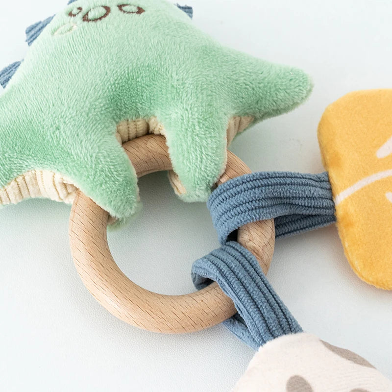 DreamRattle – Soft Dino Crib Rattle