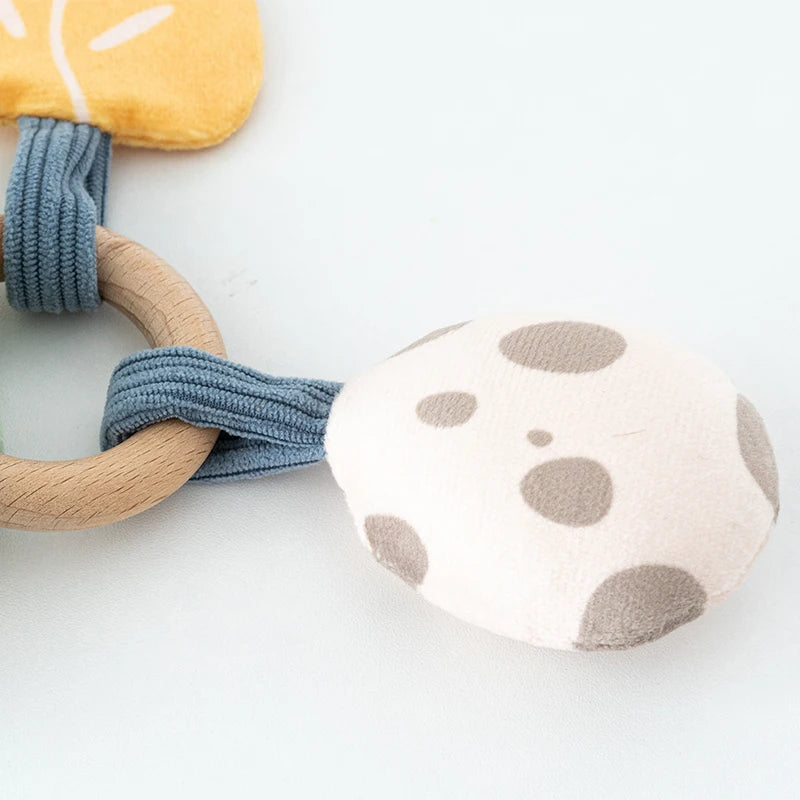 DreamRattle – Soft Dino Crib Rattle